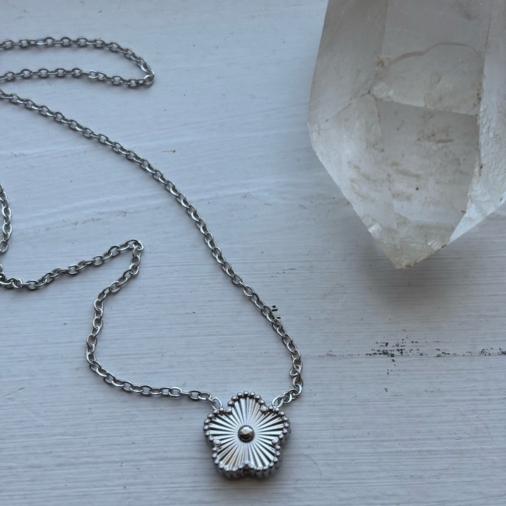Silver Tone Multi Clover charm necklace.